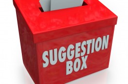 Big red suggestion box with notes